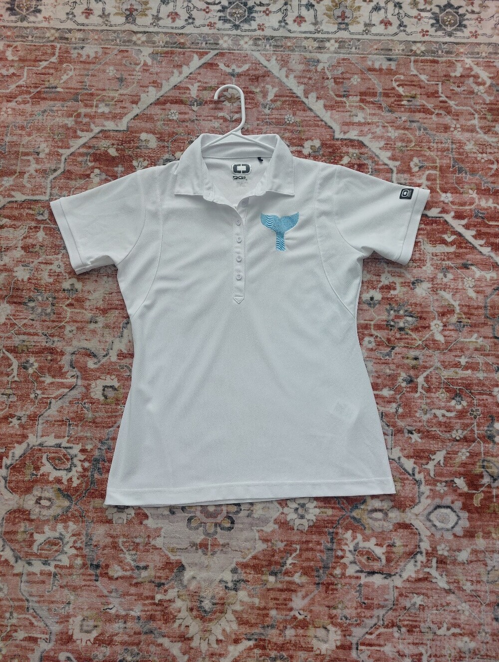 White Polo Shirt with Aqua Whale Tail Size: M
